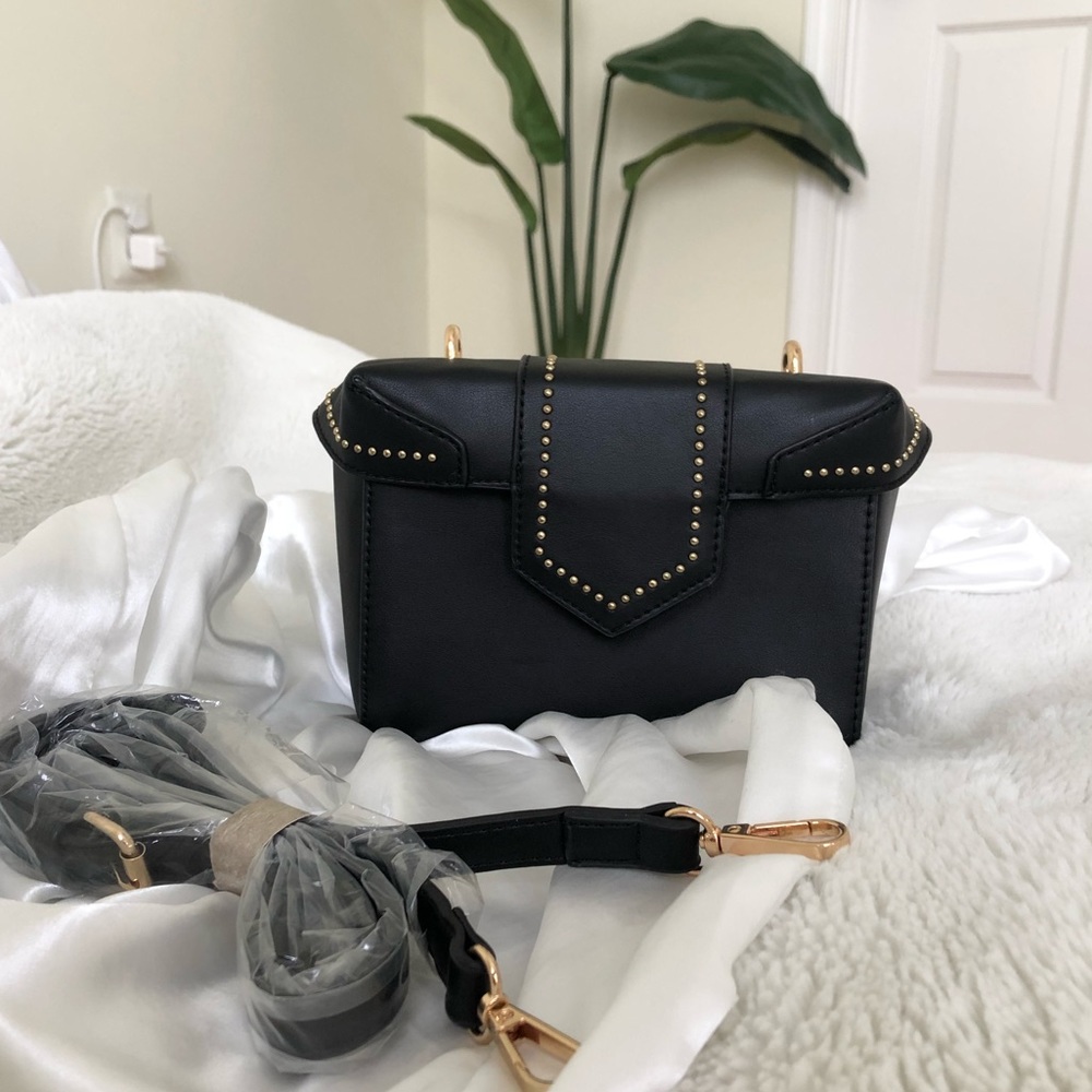 Cute black clutch with shoulder strap